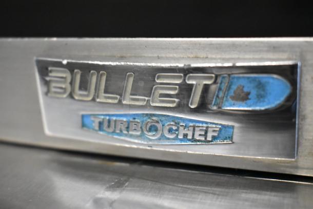 2017 Turbochef Encore2 stainless steel commercial rapid cook oven label, showing brand and model details.
