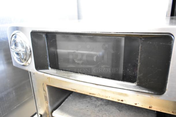 2017 Turbochef Encore2 stainless steel rapid cook oven, electric, with visible wear, on equipment stand. Model Encore2.