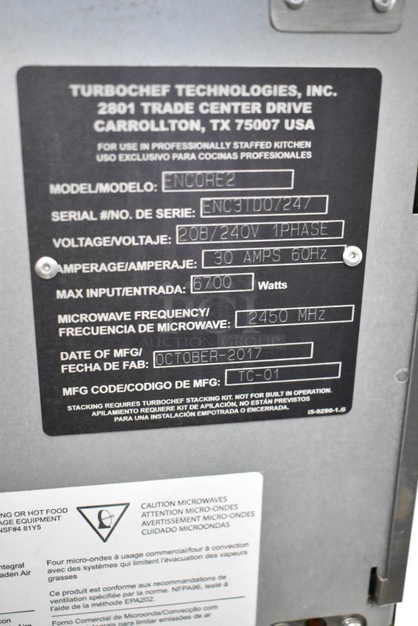 2017 Turbochef Encore2 stainless steel commercial rapid cook oven on stand, 208/240V, 1 phase, label shows model specifics.