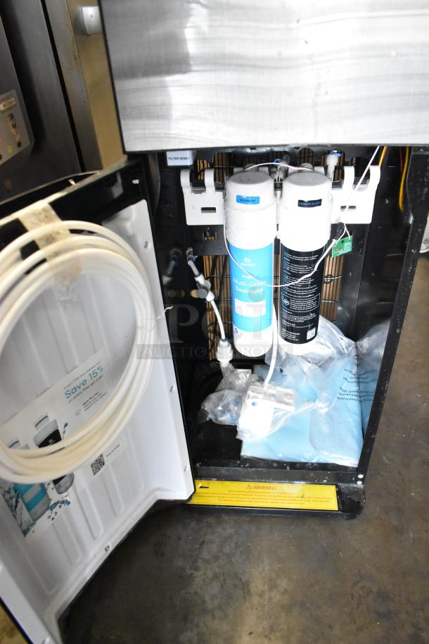 2024 Avalon A25 stainless steel water dispenser, open view showing filters. Model A25, 115 volts, 1 phase, new condition.
