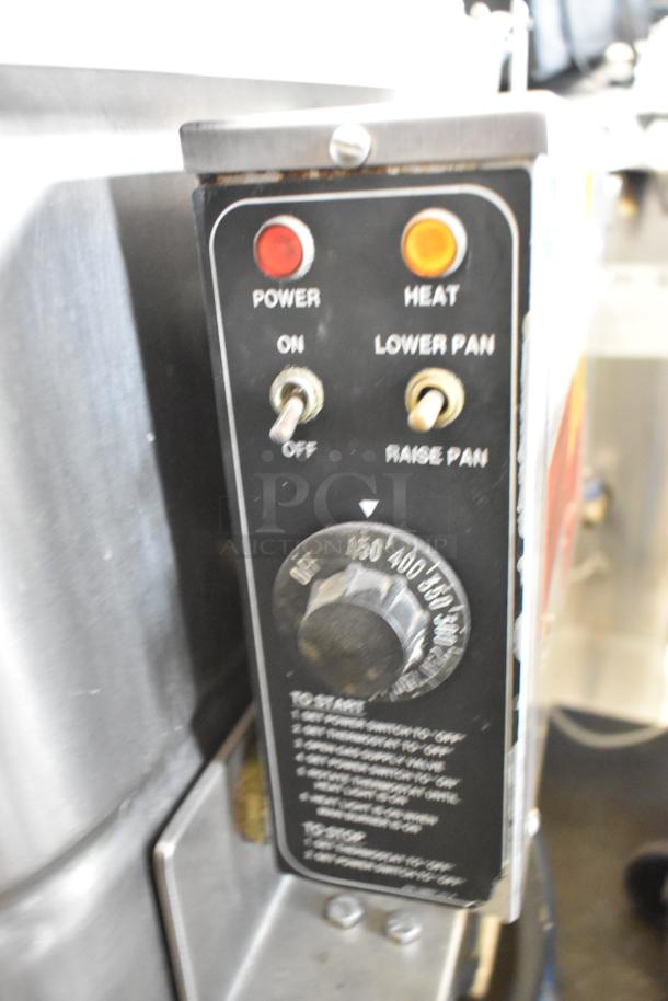 Groen NHFP/E stainless steel gas braising pan, 144,000 BTU, control panel with power and heat settings, floor style.
