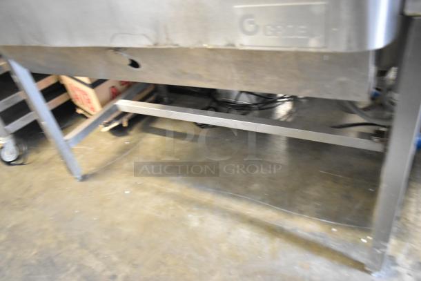 Groen NHFP/E stainless steel commercial floor braising pan, natural gas-powered, 144,000 BTU, visible logo, sturdy frame.