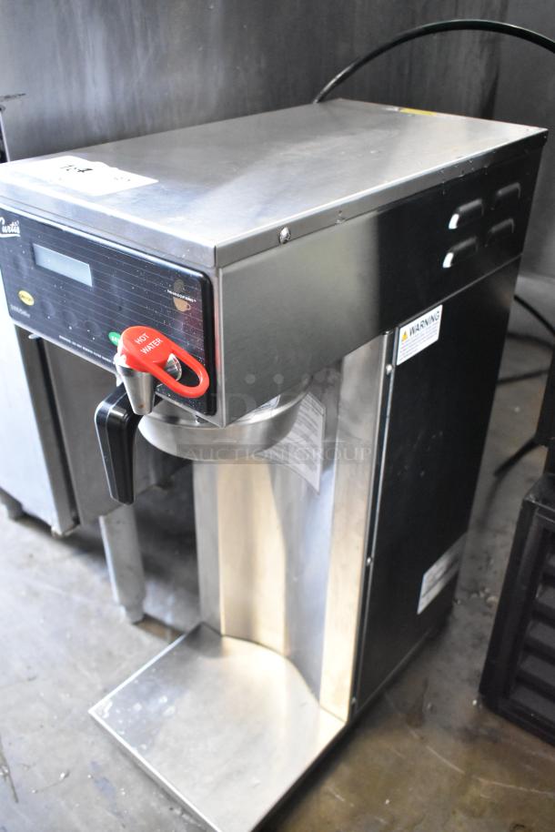 Curtis D500GT12A000 stainless steel coffee machine with hot water dispenser, metal brew basket, 120V, used condition.