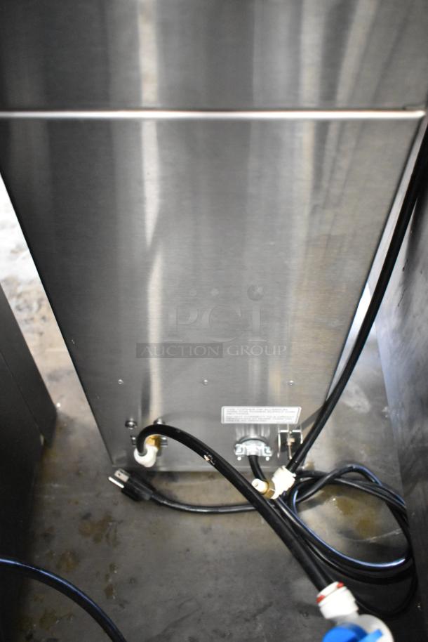 Curtis D500GT12A000 stainless steel commercial coffee machine, hot water dispenser, metal brew basket, 120V, used condition.