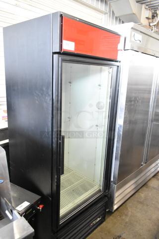 True GDM-26 metal single door cooler merchandiser, poly coated racks, 115V, 1 Phase, good condition, model tag visible.