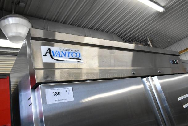 Avantco 178SS2FHC stainless steel commercial 2-door reach-in freezer with poly-coated racks and commercial casters.
