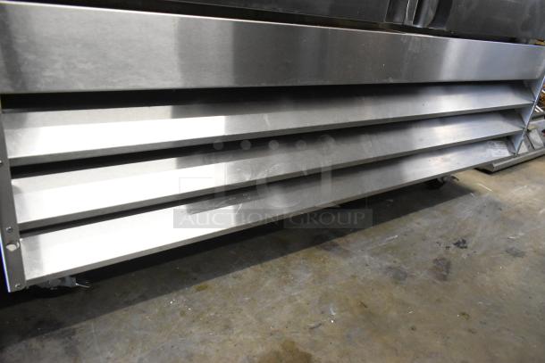 Avantco 178SS2FHC stainless steel 2-door freezer, poly-coated racks, commercial casters, 115V, 1 phase, in good condition.