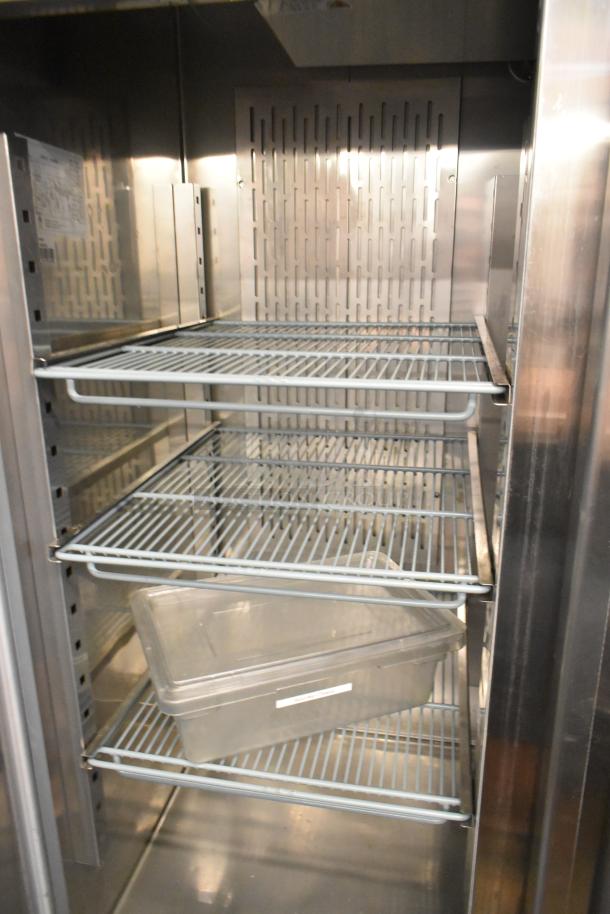 Avantco 178SS2FHC stainless steel commercial freezer, 2 doors, poly-coated racks, commercial casters, 115V, 1 phase.
