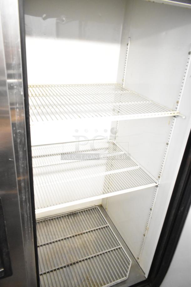 True T-49 stainless steel 2-door commercial cooler with poly-coated racks. Features commercial casters, 115V, 1-phase.