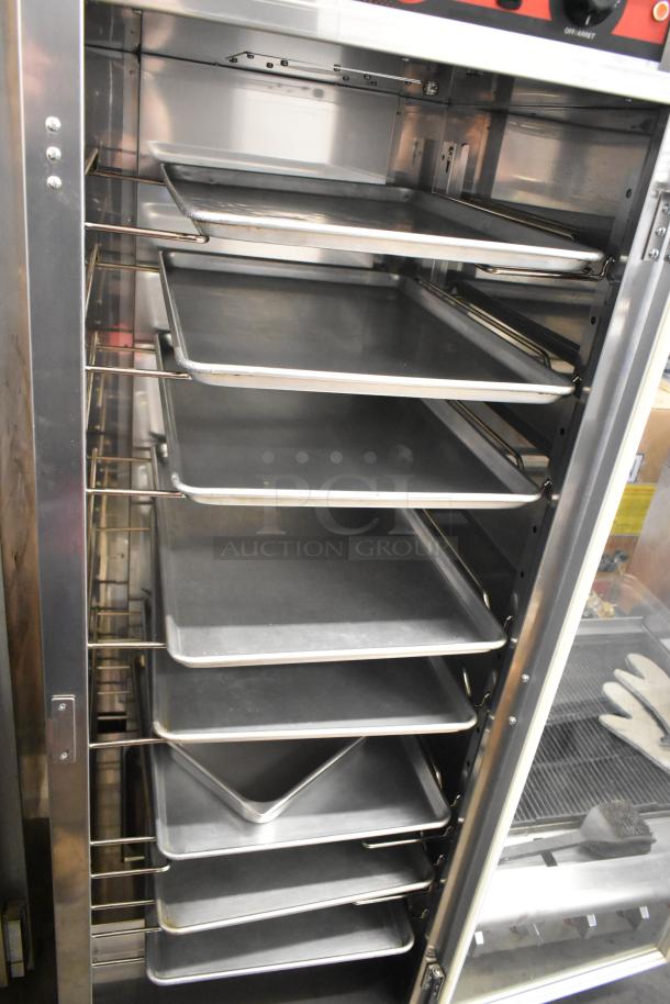 Vulcan VP18 metal heated holding proofing cabinet with shelves, on commercial casters. 120V, 1 phase, excellent condition.