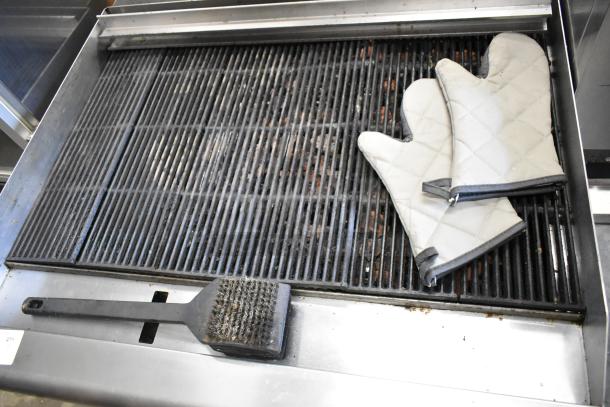 APW Wyott HCRB-2436i stainless steel commercial charbroiler grill, 120,000 BTU, includes grill brush and mitts.
