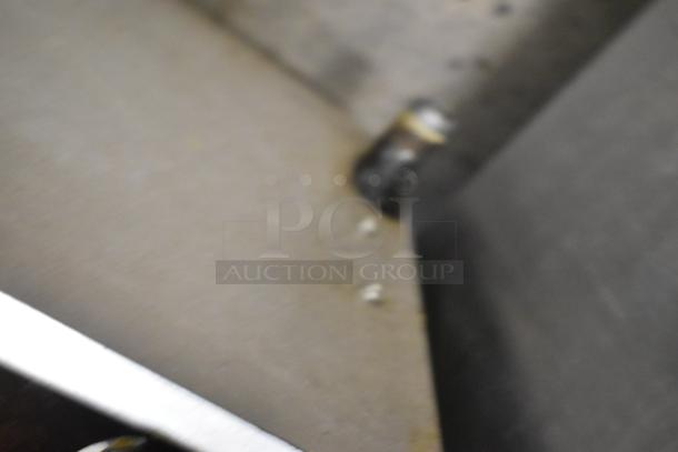 APW Wyott HCRB-2436i stainless steel commercial charbroiler grill, natural gas, 120,000 BTU, showing structural detail.