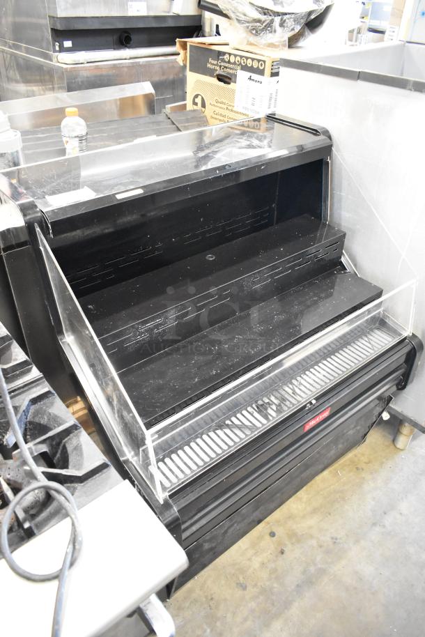 McCray SC-OS30E-3-B metal floor style open merchandiser, 115 volts, 1 phase, black finish, visible wear, clear front.