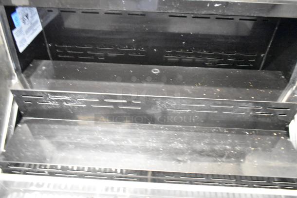 McCray SC-OS30E-3-B metal open merchandiser, floor style, visible shelves, minor wear. Model label indicates 115V, 1 phase.