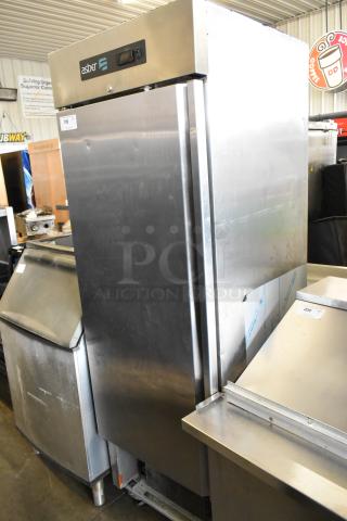 2020 Asber ARF23HF stainless steel single door commercial freezer, with casters and missing compressor cover screws.