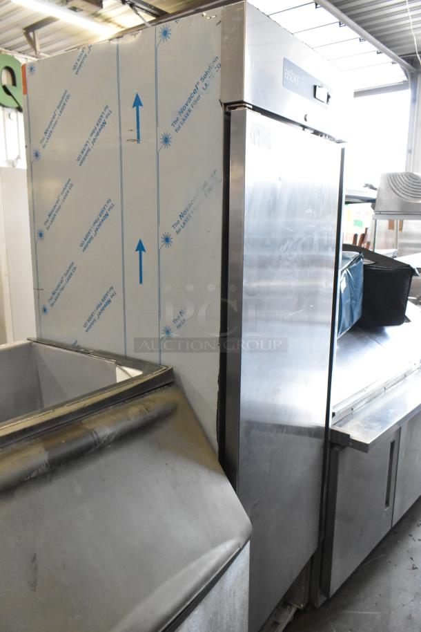 2020 Asber ARF23HF stainless steel reach-in freezer, single door, on casters. Missing screws on compressor cover.