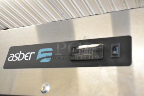 2020 Asber ARF23HF stainless steel single door reach-in freezer, digital display, missing compressor cover screws, on casters.