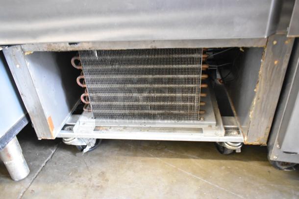 2020 Asber ARF23HF stainless steel commercial freezer on casters, 115V, missing screws on compressor cover.