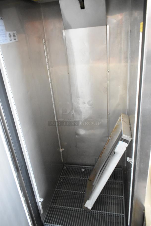 2020 Asber ARF23HF stainless steel commercial single door reach-in freezer, missing screws for compressor cover, on casters.