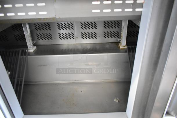 Berg EDMT7230BERG stainless steel prep table interior, clean surface, sturdy shelving, commercial grade, 115V.