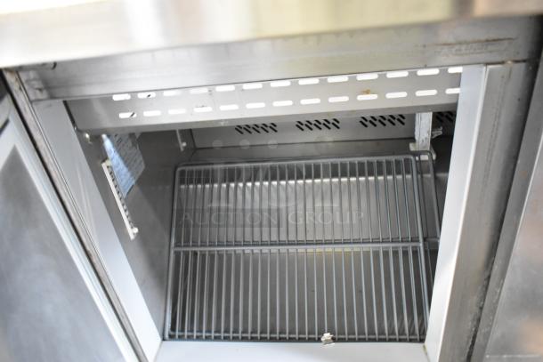 Berg EDMT7230BERG stainless steel sandwich salad prep table, interior view, includes shelf, 115V, 1 phase.