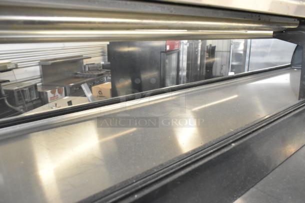 Hoshizaki HNC-180BA-L-S metal sushi display case, 115V, 1 phase. Features stainless steel finish, glass front, good condition.