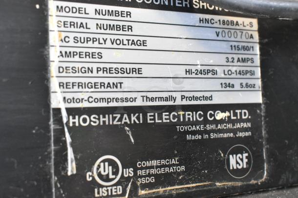 Label of Hoshizaki HNC-180BA-L-S sushi display case, 115 volts, 1 phase, 3.2 amps, UL and NSF listed, made in Japan.