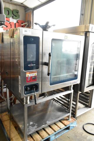 Alto Shaam CTP7-20E stainless steel commercial combi convection oven on stand, 208-240V, 3 phase. Warning label visible.