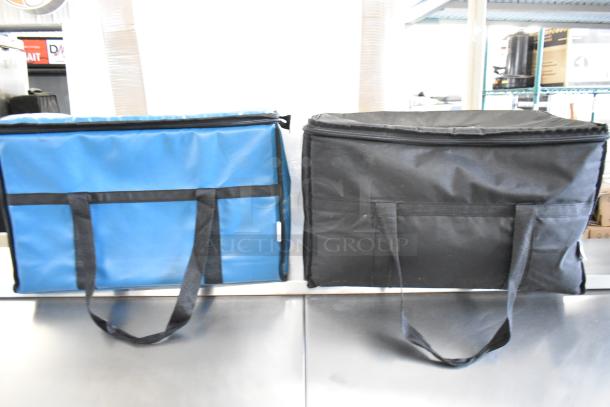 Blue and black insulated food carrying bags, 2 Choice brand, with handles; pristine condition.
