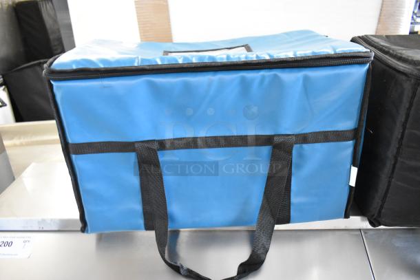Blue and black insulated food carrying bag with handles, featuring durable material. Perfect for maintaining food temperature.