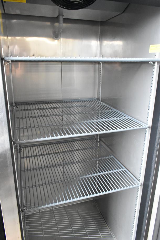 Brand new Avantco 447AP23R stainless steel single door cooler, poly-coated racks, 115V, 1 phase, minor scratches.