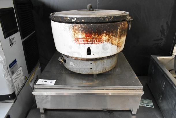 RiceMaster Rice Cooker and Adcraft BW-450 Bun Drawer, both used, with visible wear. Suitable for bulk food prep.