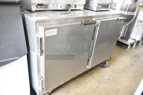 Beverage Air UCR48A stainless steel 2-door undercounter cooler, worn condition, on commercial casters, 115 volts, 1 phase.