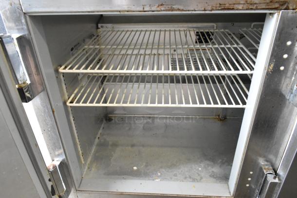 Beverage Air UCR48A stainless steel undercounter cooler, two doors, commercial casters, 115 volts, used condition.