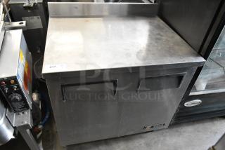 2016 True TWT-36 stainless steel 2-door work top cooler on casters, 115 volts, 1 phase; commercial use model.