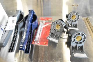 Assorted items including manual juicers, 3M head assemblies, and a CDN deep fry thermometer in packaging.