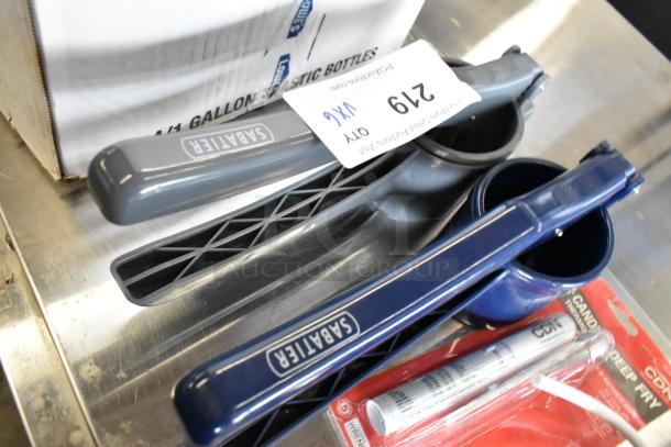 Set of items including Sabolier manual juicers, 3M head assembly, and deep fry thermometer, in good condition.