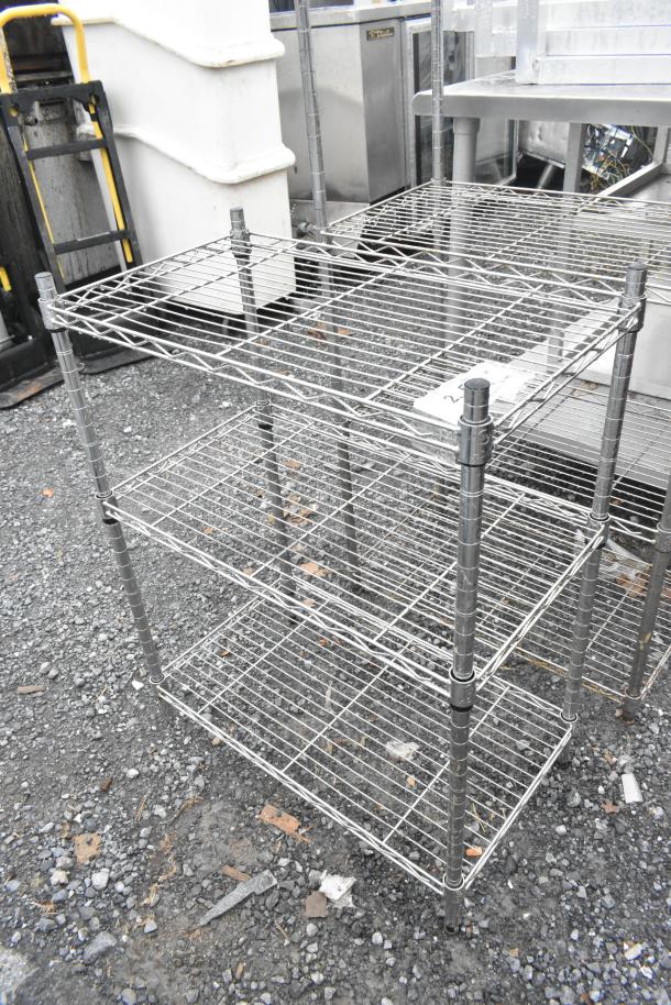 2 chrome finish wire shelves, sizes 14x24x31 and 14x24x59. Used condition. Buyer must dismantle for transport.