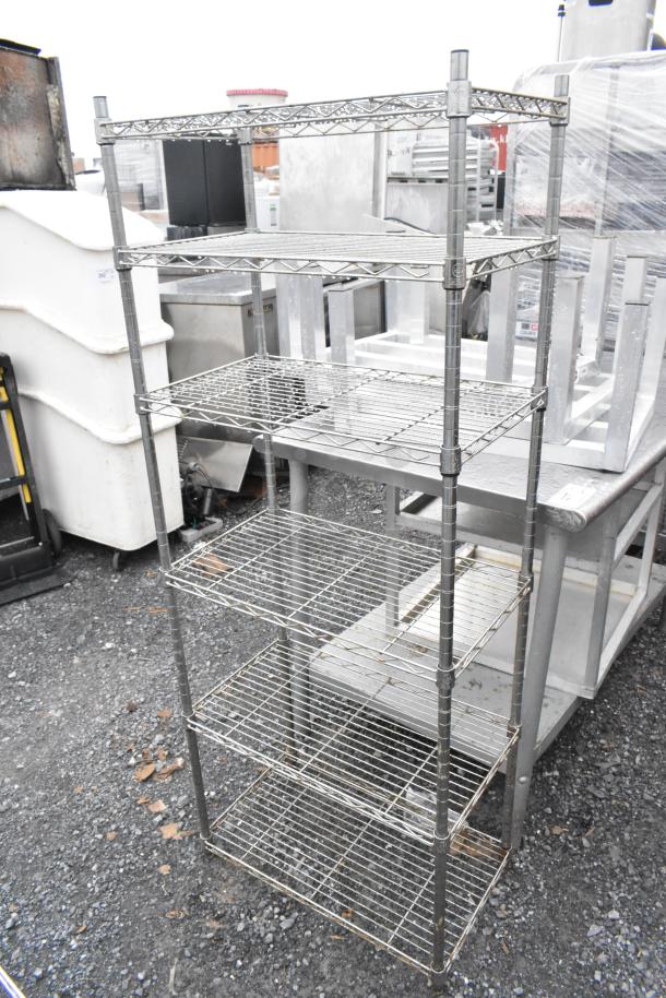 Two chrome wire shelves, sizes 14x24x31 and 14x24x59. Buyer must dismantle. Consider freight charges.