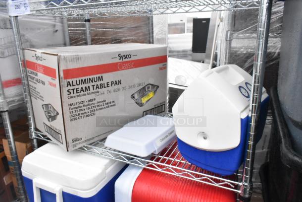 Chrome 5-tier wire shelving unit with portable coolers and Sysco aluminum steam table pan box. Buyer must dismantle.