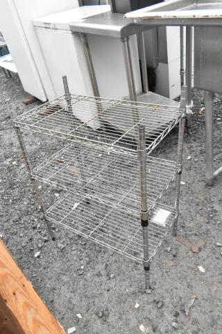 Chrome finish 3-tier wire shelving unit. Good condition. Buyer must dismantle; consider freight charges.
