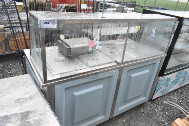 Delfield SE-H4 stainless steel steam table, visible glass crack, 120/208V, 1 phase, stickers and markings present.