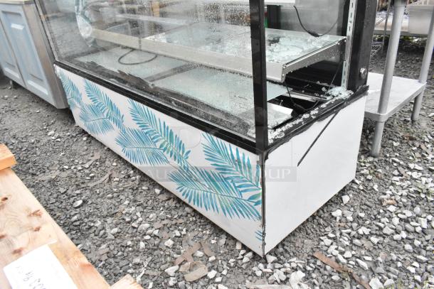 Omcan RS-CN-0571-S Deli Display Case with broken glass, metal frame, commercial floor style, decorative panel design.