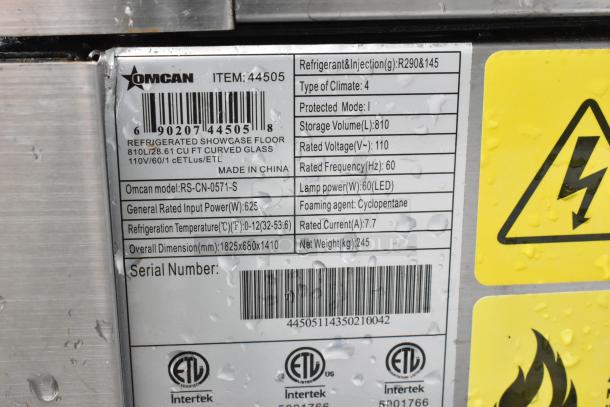 Omcan RS-CN-0571-S metal deli display case label showing model, dimensions, and specs. Note broken glass indicator.