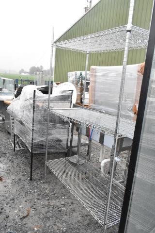 Chrome finish 3-tier wire shelving unit, sturdy build, dimensions unspecified. Buyer must dismantle; freight charges apply.