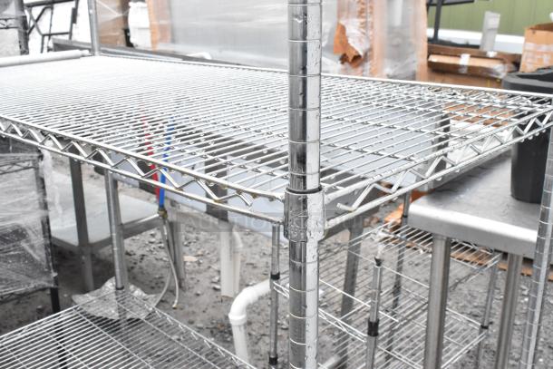Chrome finish 3-tier wire shelving unit, excellent condition, requires dismantling by buyer, consider freight charges.