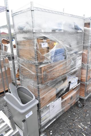 Chrome 6-tier wire shelving unit with contents, including plasticware. Buyer must dismantle. Freight charges apply.
