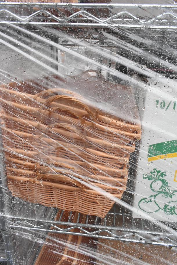 Chrome finish 5-tier wire shelving unit with YL2512 containers and baskets. Buyer must dismantle. Wrapped in plastic.