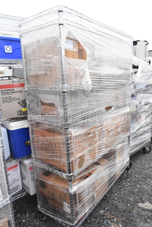 Chrome finish 6-tier wire shelving unit with boxed contents, wrapped in plastic. Buyer must dismantle; freight charges apply.