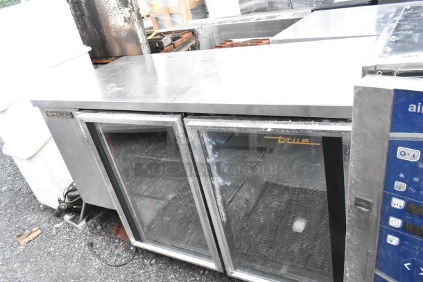 True TBB-2G-S 2 Door Back Bar Merchandiser; stainless steel; glass doors; 115 volts; commercial use.